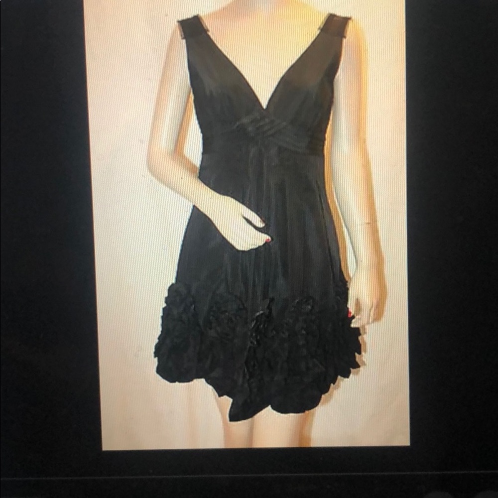 NWT black bcbg dress. Sold out. Cocktail dress.